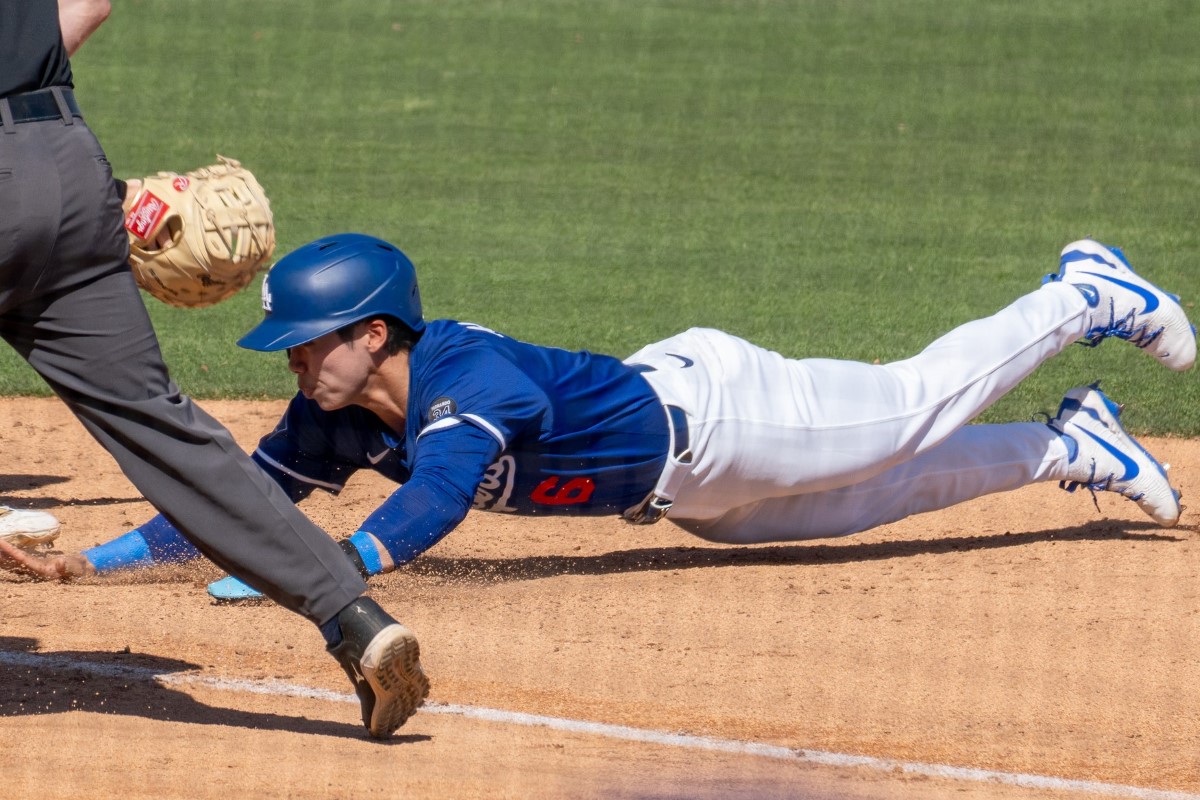 Thrilling upcoming MLB games to keep you on the edge of your seat! MLB Schedule 2025 upcoming Games 2 Kim Hye-seong diving during a MLB game